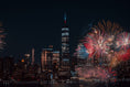 Fireworks over a city skyline