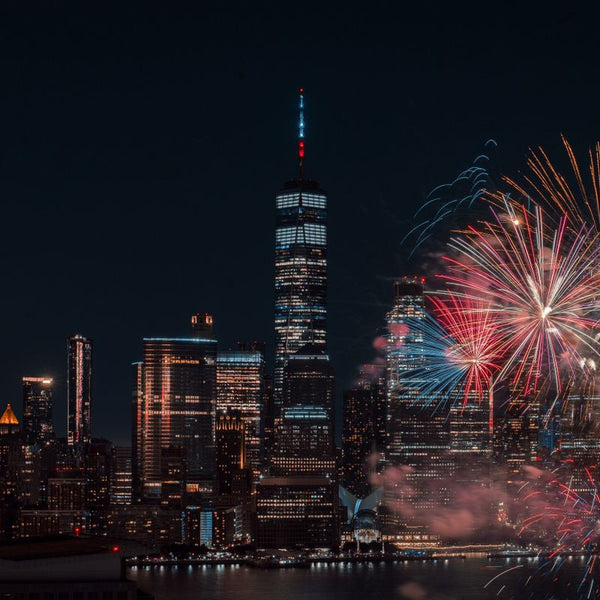 Fireworks over a city skyline