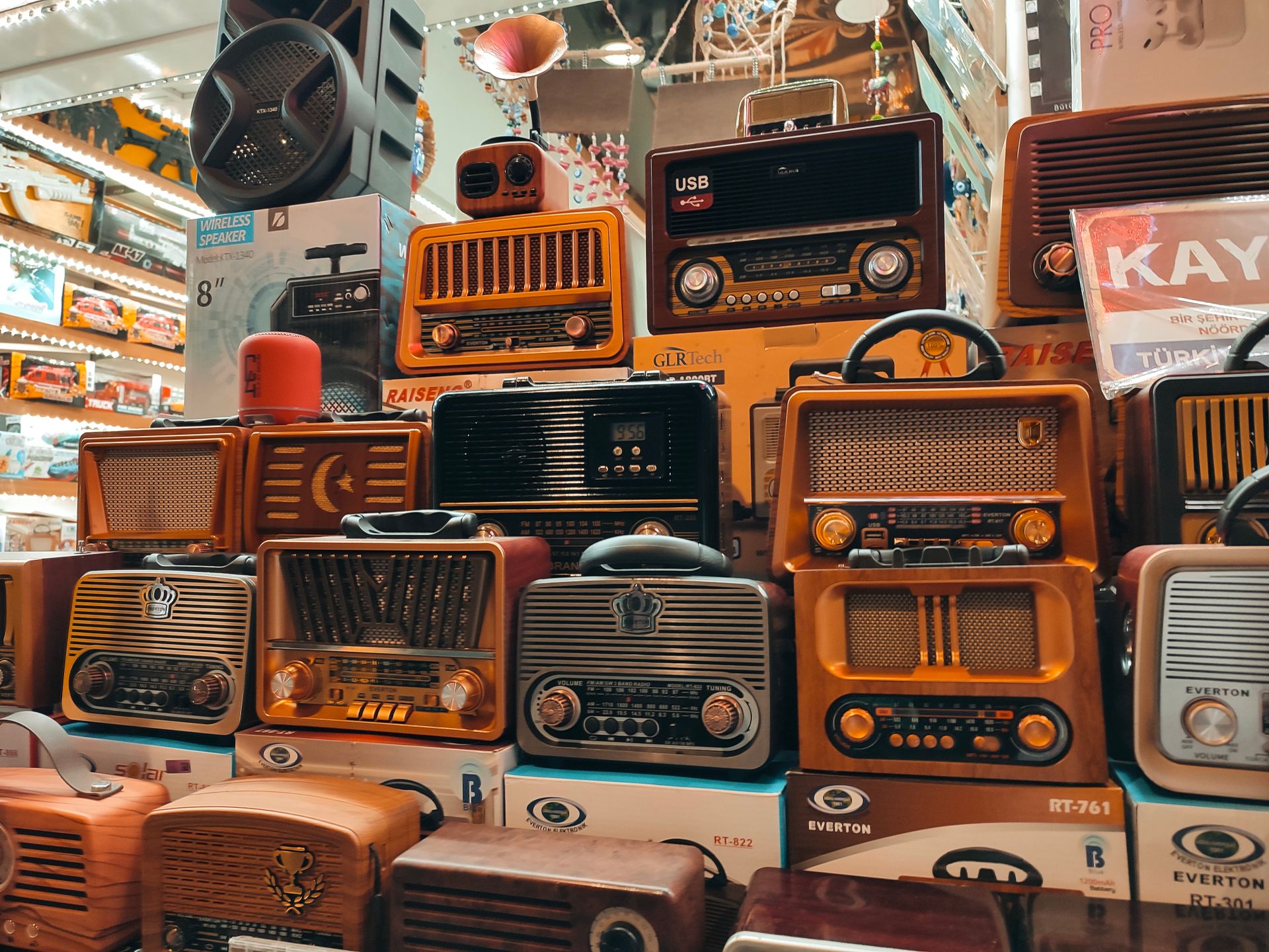 Wall of vintage radios in an electronics shop